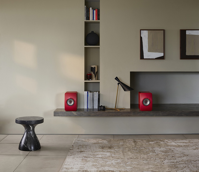 20-KEF-LS50Wireless-II-CrimsonRedSpecialEdition-StoneLedge-Lifestyle-scaled.jpg